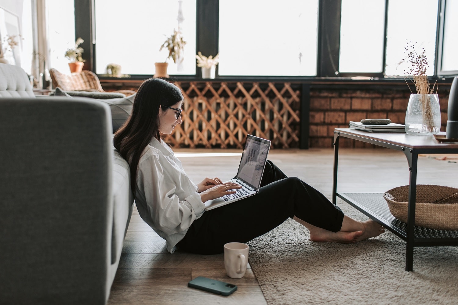 A woman working with an Amazon prep centre whilst at home.